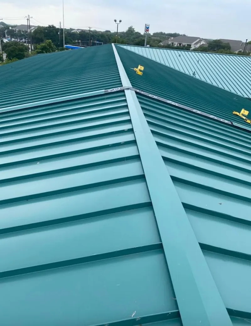 Green commercial metal roof ridge and valley for Metal Roof Repair in Harrisonville