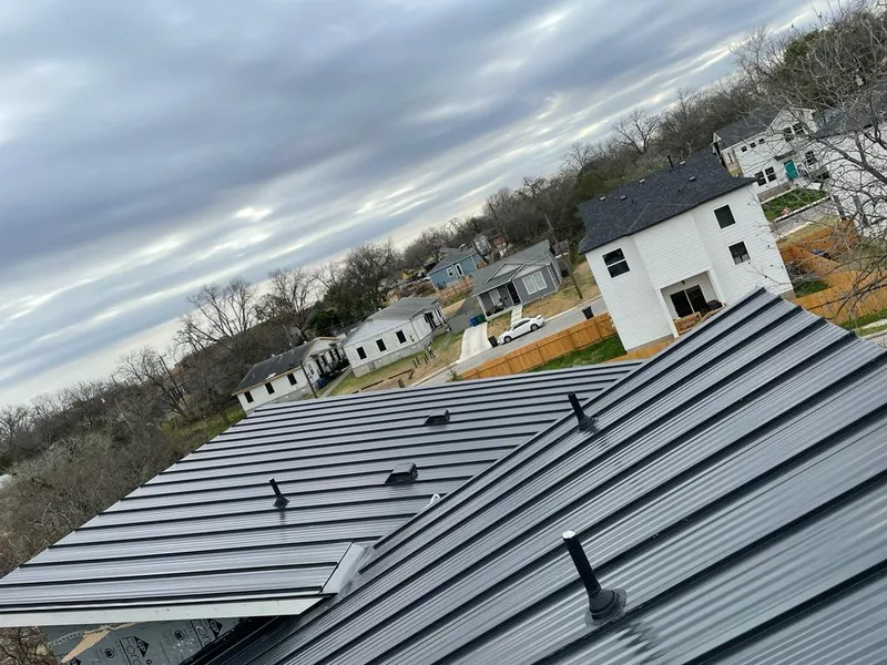 Standing seam metal roof panels with vents for Skylight Repair in Harrisonville